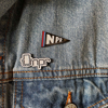 Black, red and blue NPR flag pin