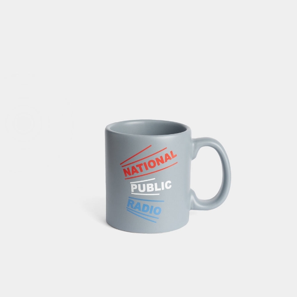 Gray mug with red, white and blue NPR logo