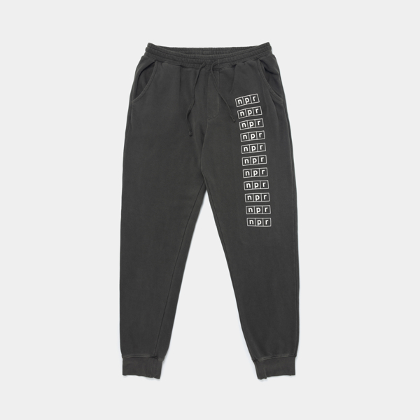 Grey joggers with the NPR logo and integrity is not dead verbiage