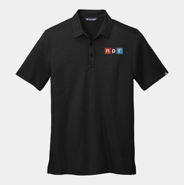 TravisMathew black polo with NPR logo embroidered on the left chest