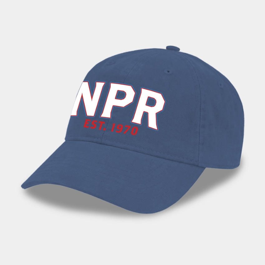 Blue baseball cap with NPR logo patch on front