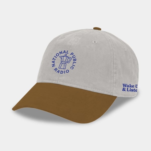 Grey and brown cap with the NPR Wake Up & Listen Design embroidered on the front